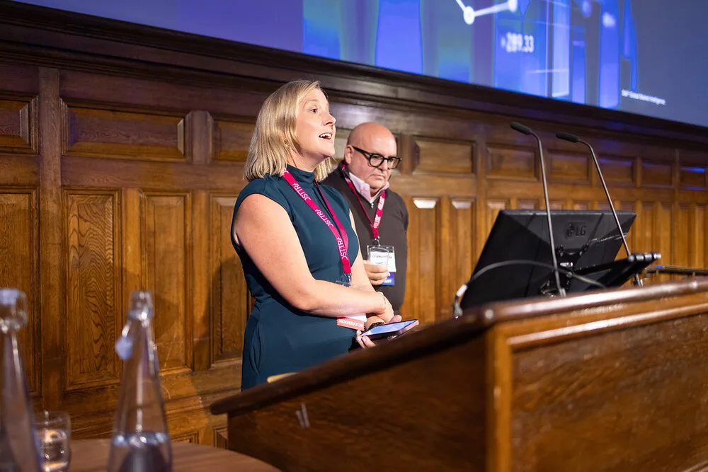 Sinead O'Sullivan on stage alongside a colleague between sessions